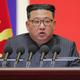 In this photo provided by the North Korean government, North Korean leader Kim Jong Un speaks during a “maximum emergency anti-epidemic campaign meeting” in Pyongyang, North Korea, Aug. 10, 2022.